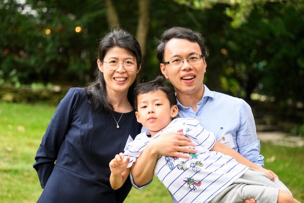 A young faculty family at a picnic.